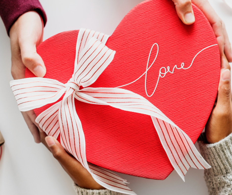 St Valentines Day Concept Young Woman Making A Surprise Gift To Her Man Stock Photo